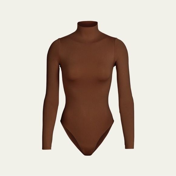 Essential Mock Neck Long Sleeve Bodysuit in Cocoa by Skims - Picture 1 of 5